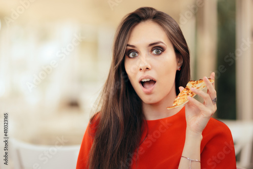 Funny Woman Eating a Pizza Slice in a Restaurant