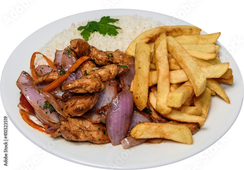 Peruvian food saltado chicken, french fries, seasoned chicken, onions, tomatoes, roasted vegetables, white arros on a white plate. photo