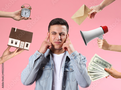Stressed young man with lot...