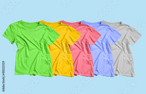 Stylish t-shirt on wooden background