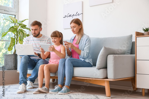 Family with modern devices ...