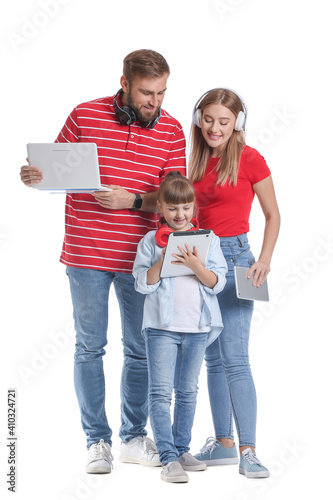 Happy family with gadgets o...