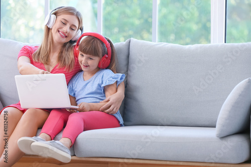 Mother and daughter with he...