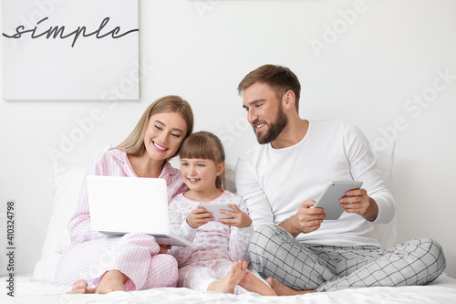 Happy family with modern de...