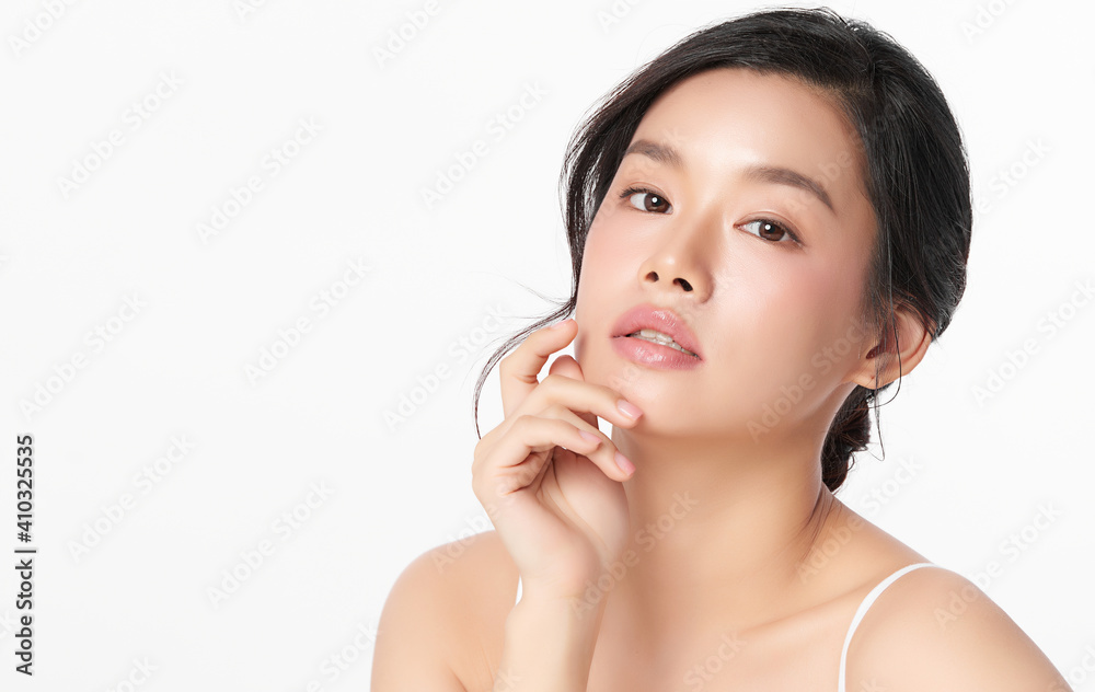Beautiful young asian woman with clean fresh skin on white background, Face care, Facial treatment, Cosmetology, beauty and spa, Asian women portrait Beautiful young asian woman with clean fresh skin on white background, Face care, Facial treatment, Cosmetology, beauty and spa, Asian women portrait