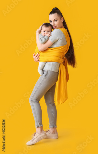 Young mother with little ba...
