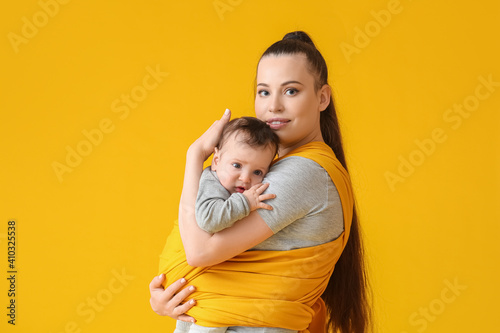 Young mother with little ba...