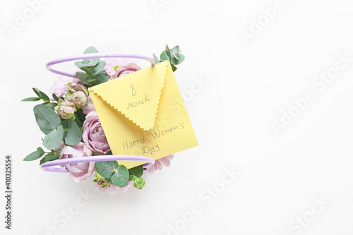 Beautiful flowers and greeting card for International Women s Day on white background