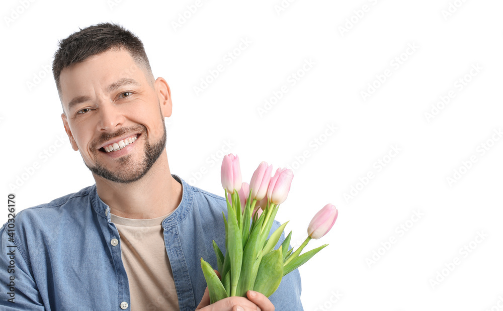 Handsome man with bouquet of beautiful flowers on white background Handsome man with bouquet of beautiful flowers on white background