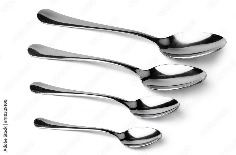 Set of silver spoons cutlery isolated on white Set of silver spoons cutlery isolated on white