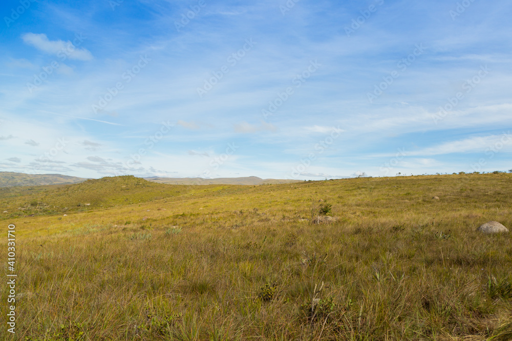 Blue Sky and green Gras in the fascinating Serra do Cipo National Park in Minas Gerais, Brazil