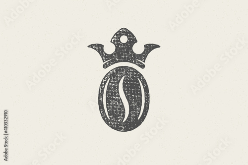 Black silhouette of coffee bean with crown high quality drink hand drawn stamp effect vector illustration.