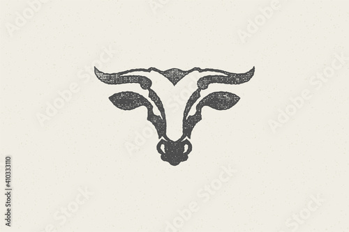 Bull head silhouette with large horns for animal husbandry industry hand drawn stamp vector illustration.