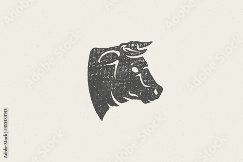 Bull head silhouette with large horns for animal husbandry industry hand drawn stamp vector illustration.