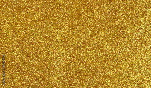 Gold glittery texture. Glit...