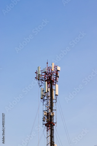 Telecom tower and blue sky. © Prapan