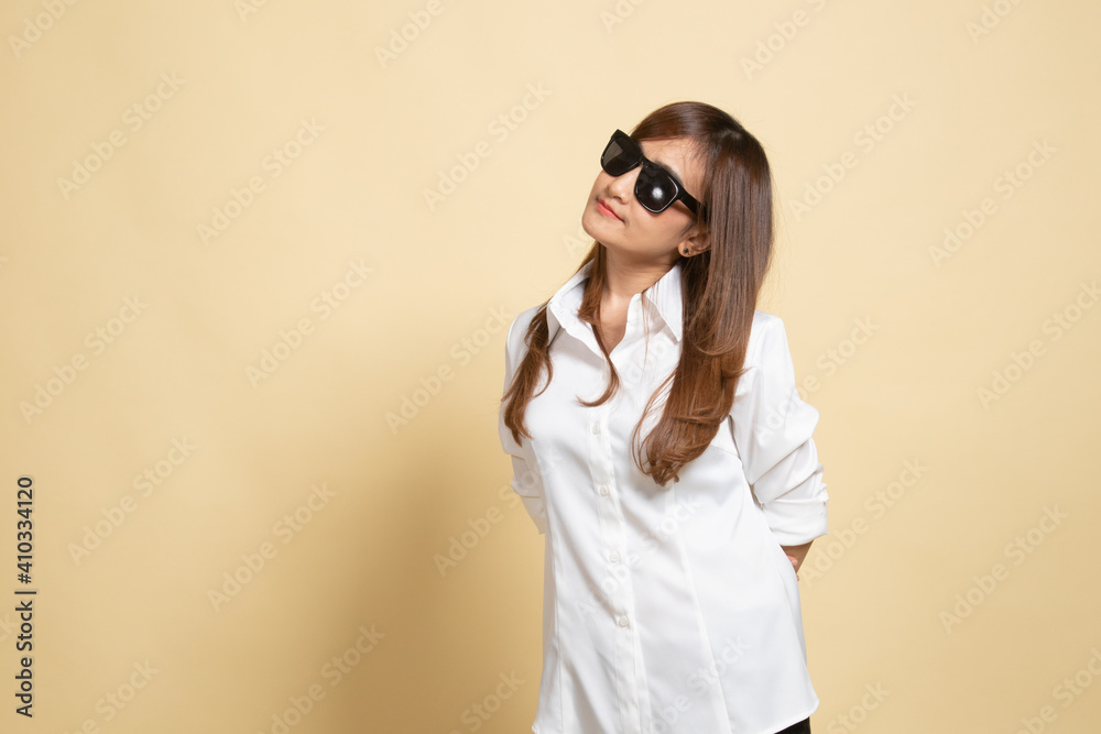 Portrait of a beautiful young asian girl in sunglasses. Portrait of a beautiful young asian girl in sunglasses.