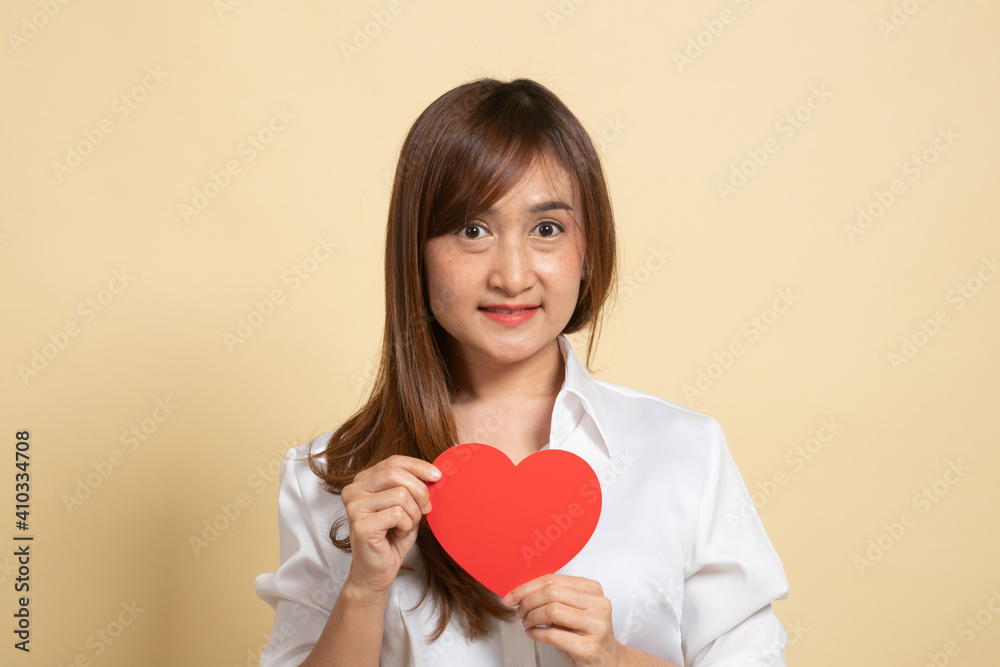 Asian woman with red heart. Asian woman with red heart.