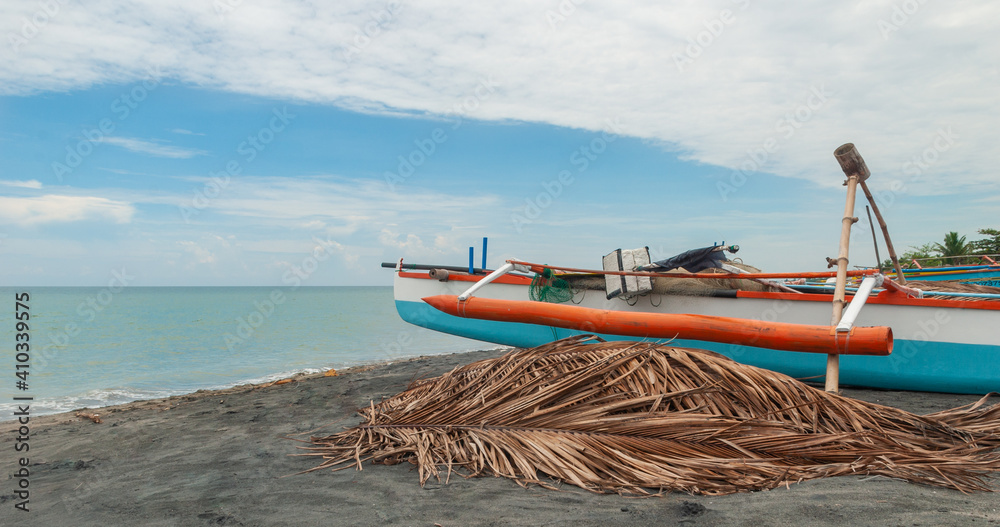Obraz premium Fishing boat on the beach