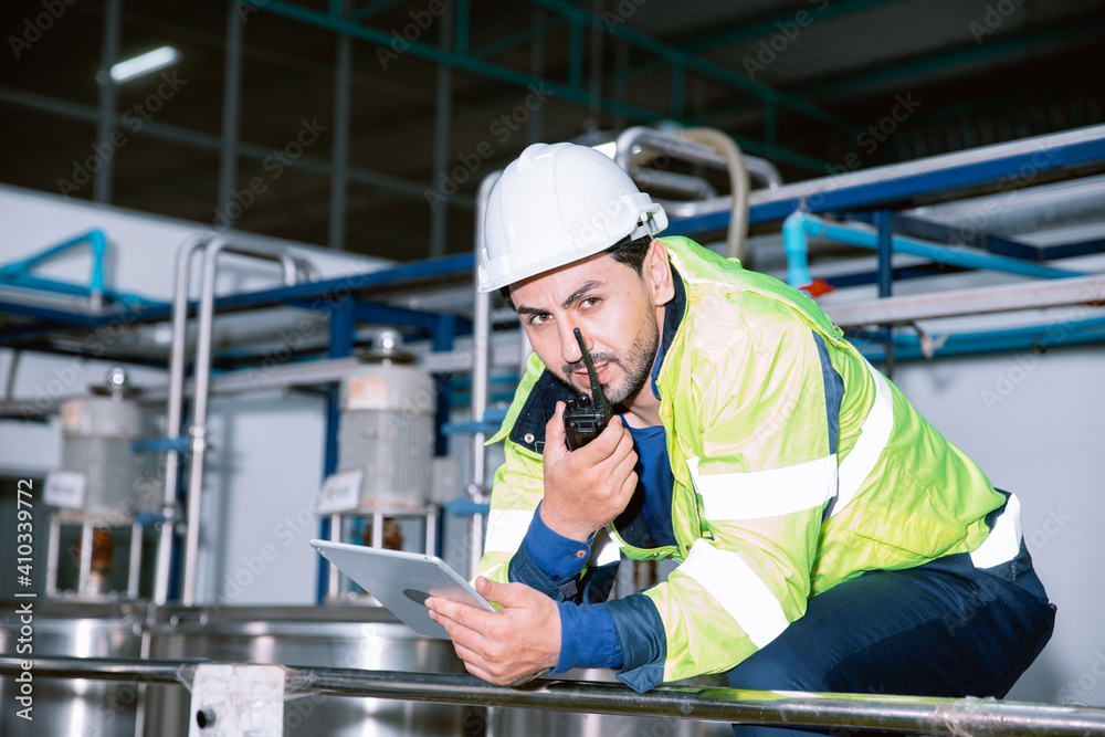 Employer Engineer Engineer worker team communication using radio while working in ...