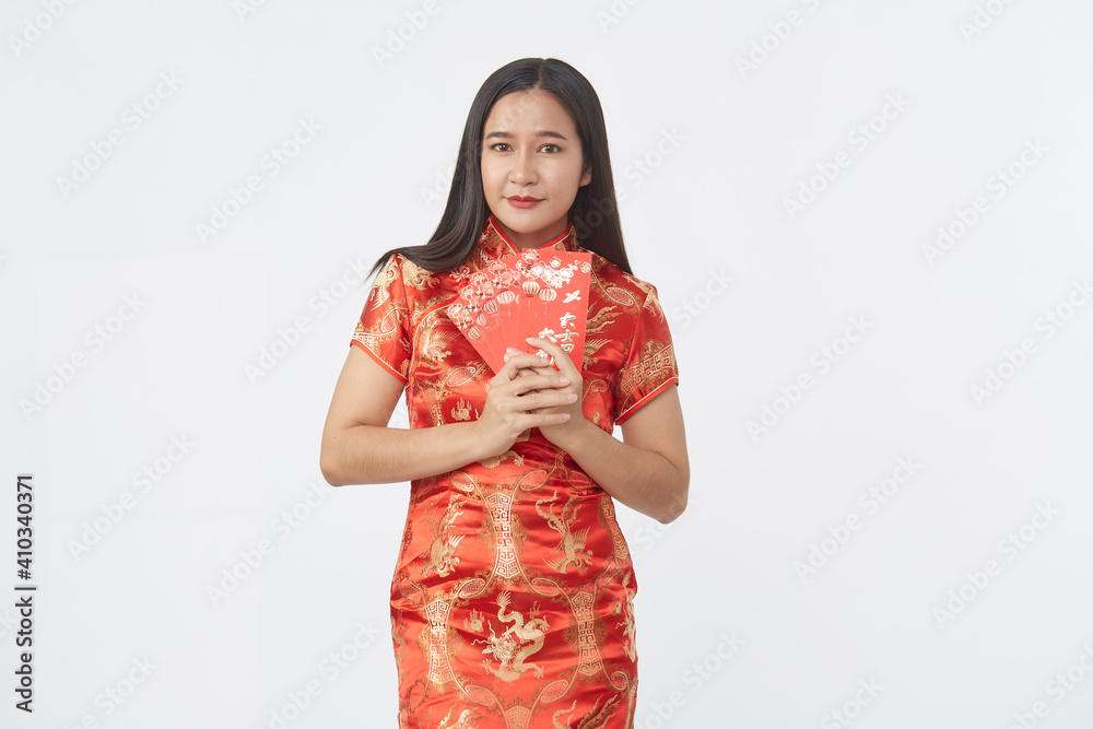 Asian woman in traditional red cheongsam dress Asian woman in traditional red cheongsam dress