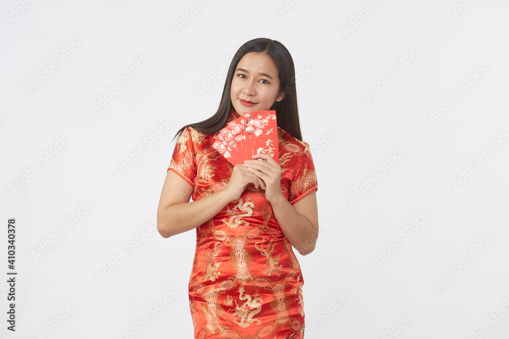 Asian woman in traditional red cheongsam dress Asian woman in traditional red cheongsam dress