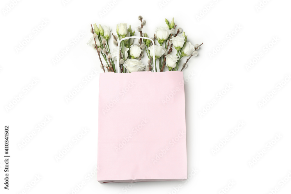 Pink paper bag with roses and willow catkins isolated on white background - obrazy, fototapety, plakaty 