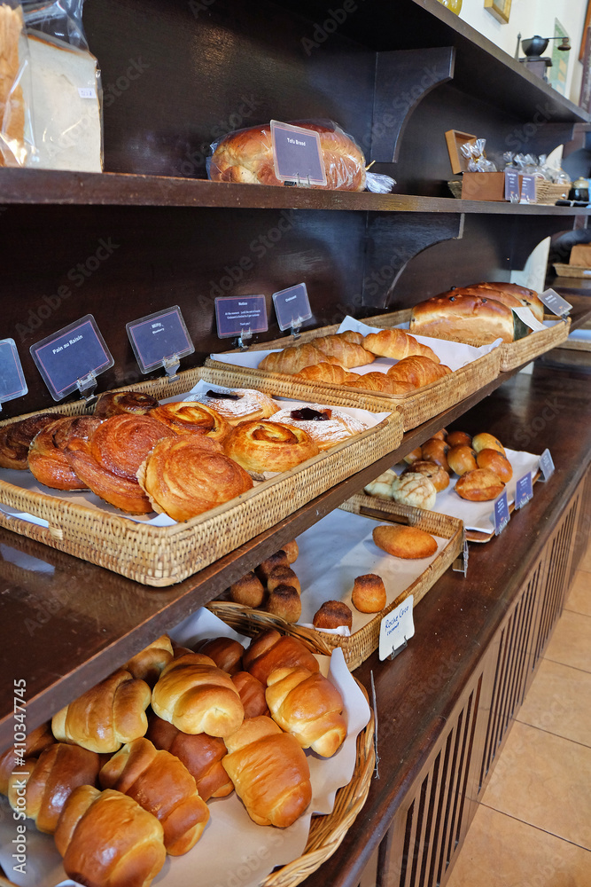 Assorted bread and toast displayed in bakery  pastry shop