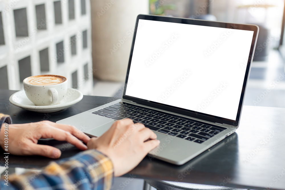 computer screen blank mockup.hand woman work using laptop with white background for advertising,contact business search information on desk at coffee shop.marketing and creative design computer screen blank mockup.hand woman work using laptop with white background for advertising,contact business search information on desk at coffee shop.marketing and creative design