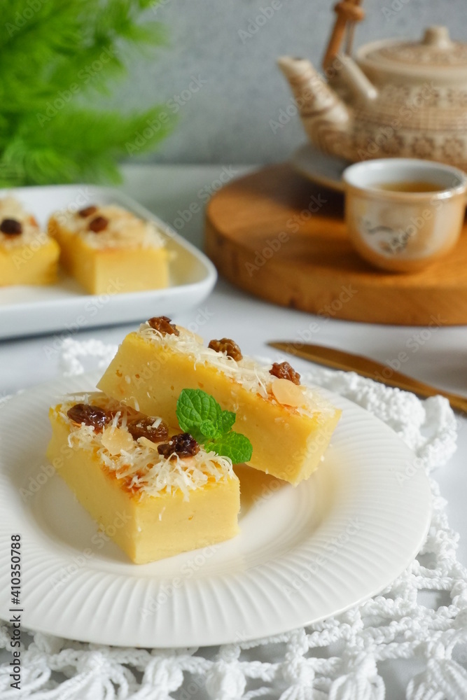 slice of fermented cassava cake in a white plate