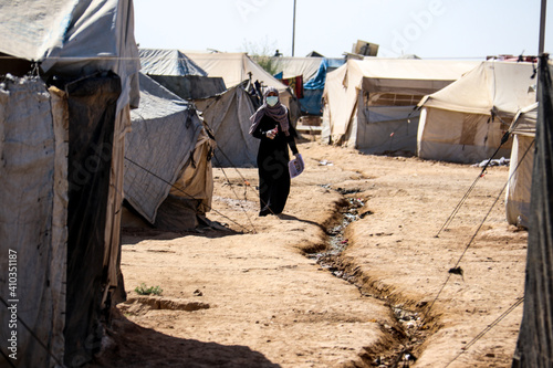 Afghanistan refugee camp life and children in poverty in the desert heat in the North in the middle of Summer 2020 photo