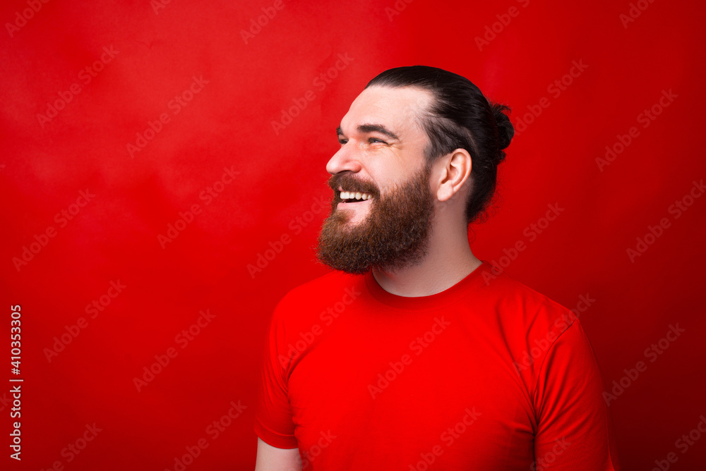 A nice portrait of a man smiling and looking away . A nice portrait of a man smiling and looking away .