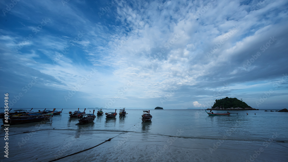 Koh Lipe, Andaman Sea, Thailand, 18 September 2019: Koh Lipe has beautiful beaches and sea. There are many longtail boats of fishermen on Koh Lipe, Thailand. Koh Lipe, Andaman Sea, Thailand, 18 September 2019: Koh Lipe has beautiful beaches and sea. There are many longtail boats of fishermen on Koh Lipe, Thailand.