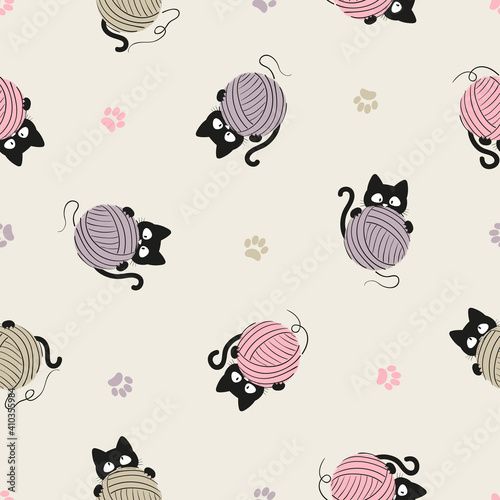 Black cats with yarn balls pattern. Seamless knitting background.