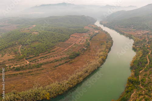 Aerial view of landscape with river Ebro in Terragona countryside near the city of Miravet, Spain. photo