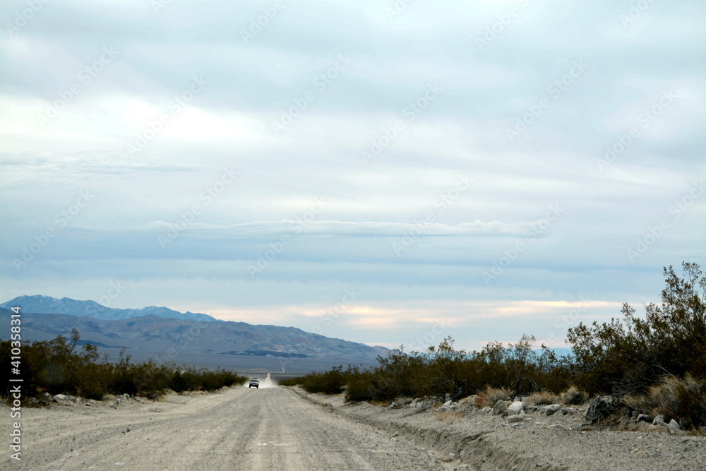 road trip over loose gravel on Big Pine road at the northern end of the Death Valley National Park in December California road trip over loose gravel on Big Pine road at the northern end of the Death Valley National Park in December California