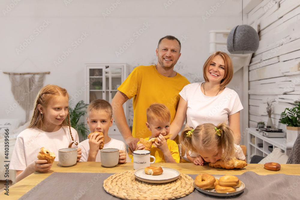 happy family having breakfast together at home