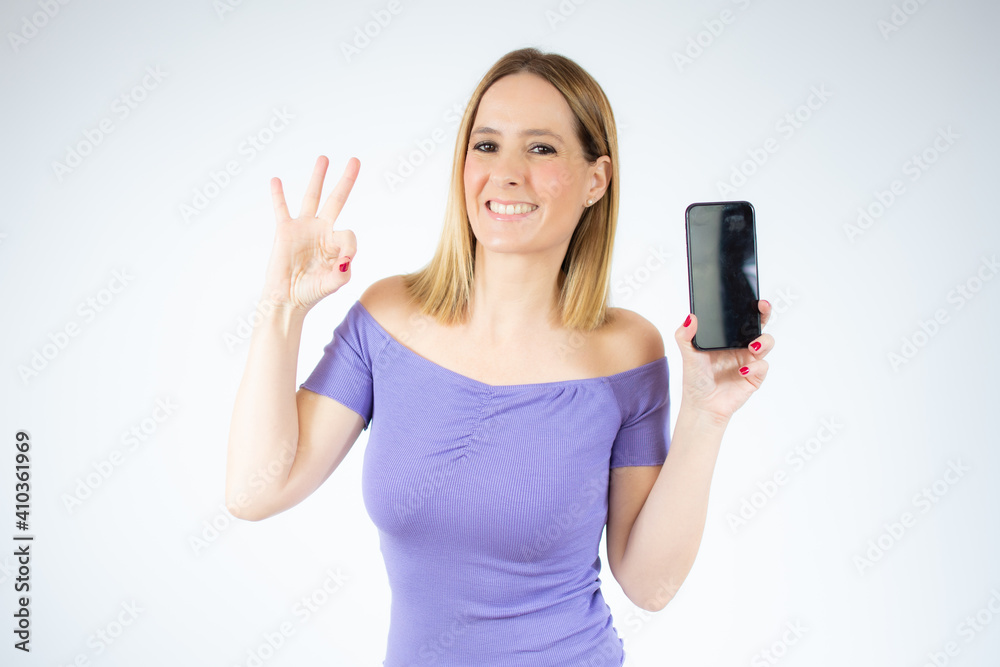 Portrait of beautiful woman using mobile phone, isolated over white background. Portrait of beautiful woman using mobile phone, isolated over white background.