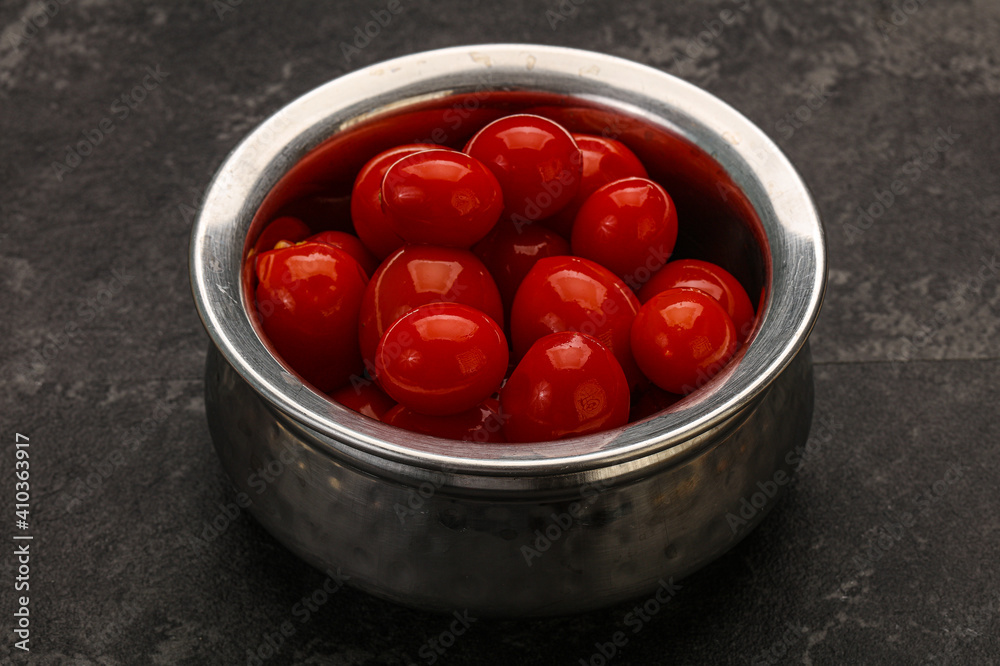 Pickled cherry tomatoes in the bowl Pickled cherry tomatoes in the bowl