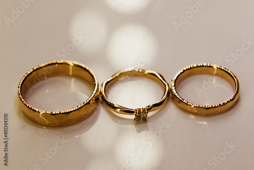 Gold wedding rings close up.