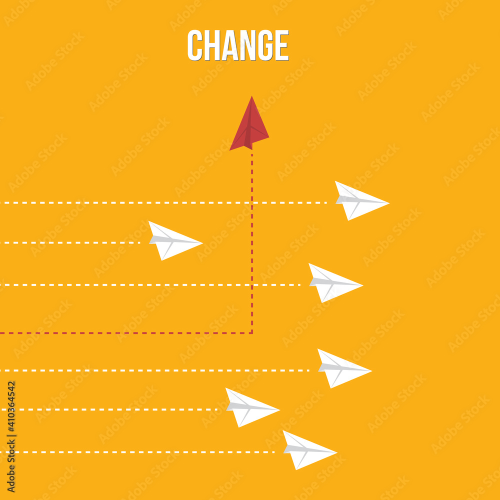 Think differently concept. Red airplane changing direction. Think differently concept. Red airplane changing direction.
