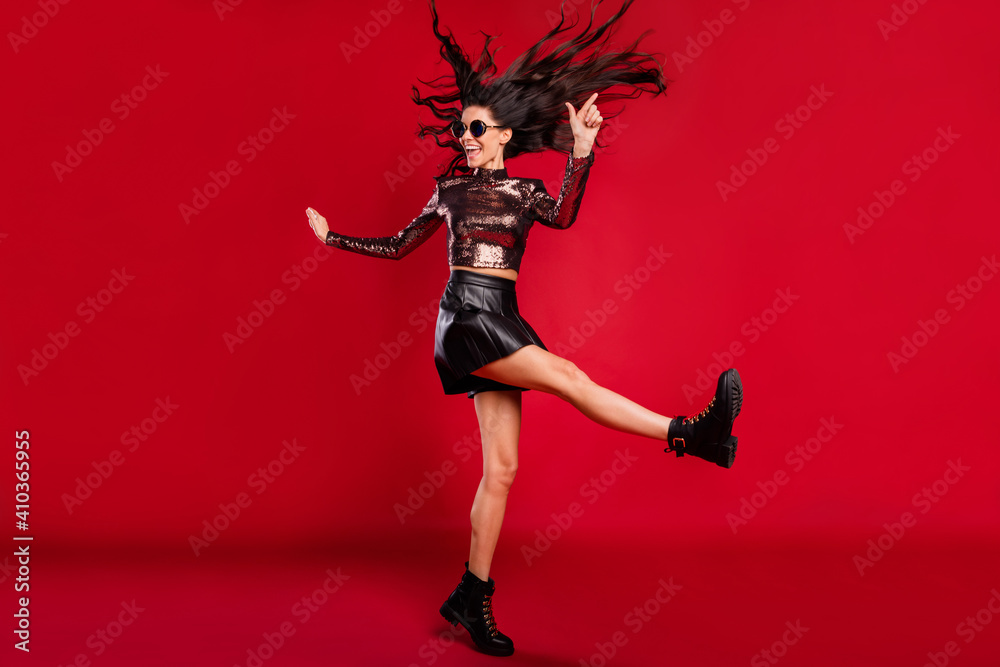 Full length photo of girl dance wear glossy top specs short skirt footwear isolated red color background