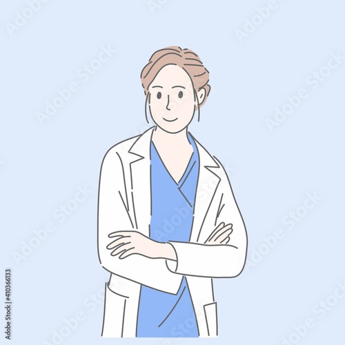 Happy doctor standing and crossing arm.