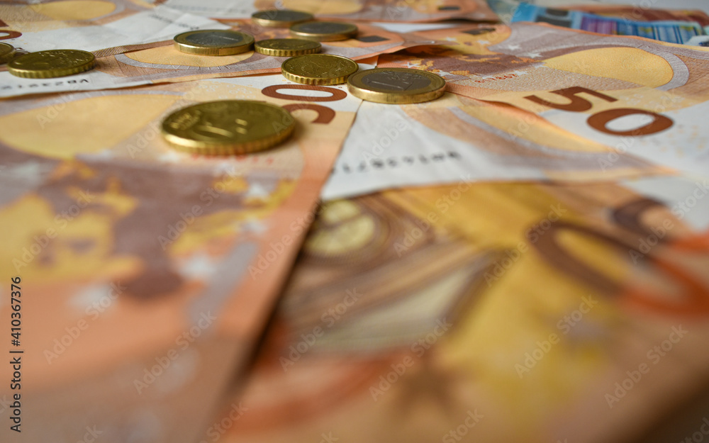 Background of euro notes and coins symbol of the European economy. Background of euro notes and coins symbol of the European economy.