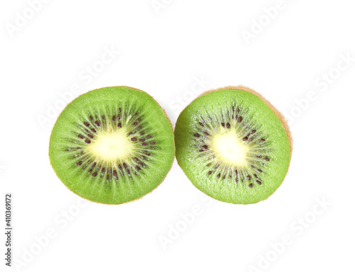 Halves of fresh kiwi on white background, top view
