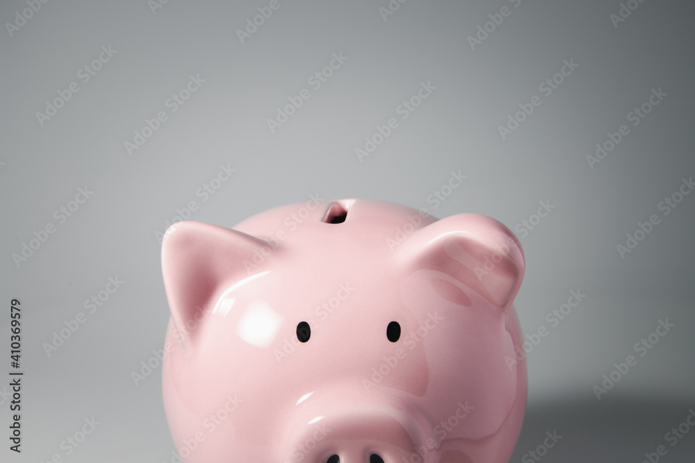 Close up haft body of Piggy bank and copyspace for Finance, saving money and debtless concept