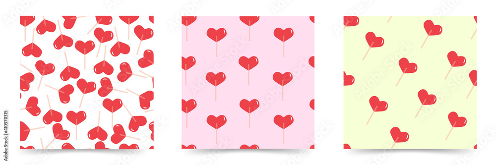  Set of vector seamless patterns with candy in the shape of a heart.Lollipops on a stick on a multi-colored background.