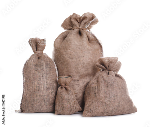 Burlap bags on white background. Organic material