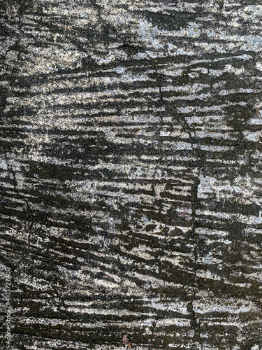 Weathered old wall with rough surface. Grunge and abstract texture background image.