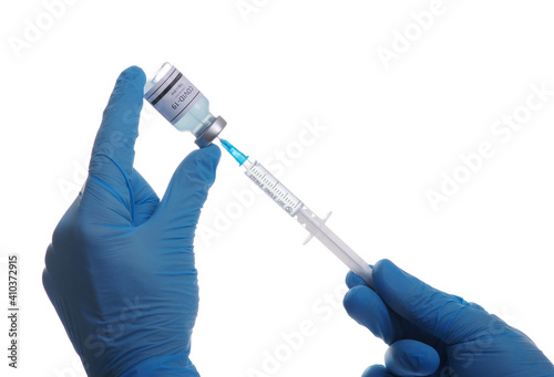 Doctor hand holding a syringe with vaccines